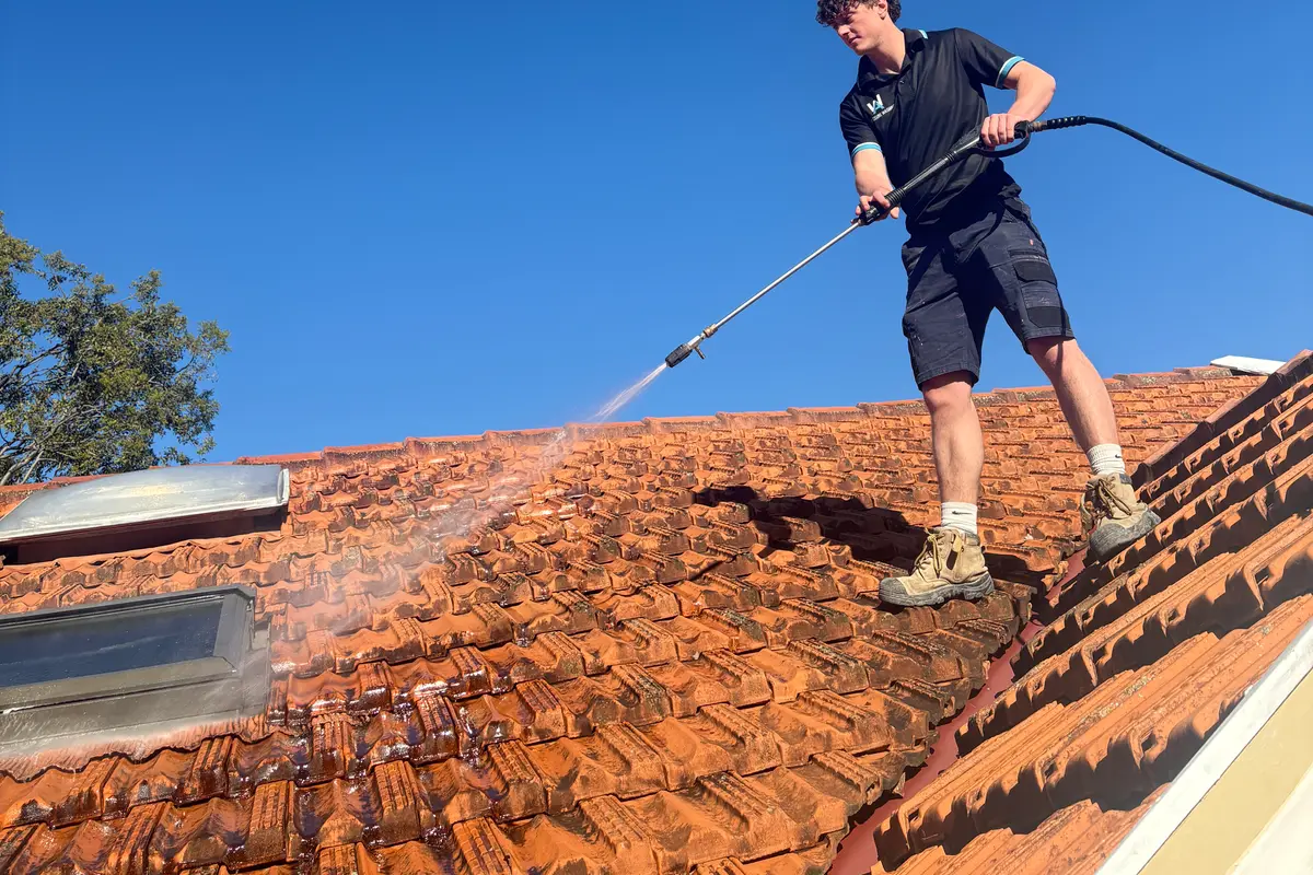 TGG technician working on a tiled Sydney roof